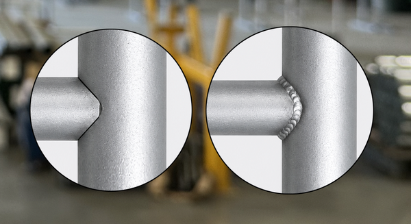 Close‑up of pipe notching on a chain‑link gate rail