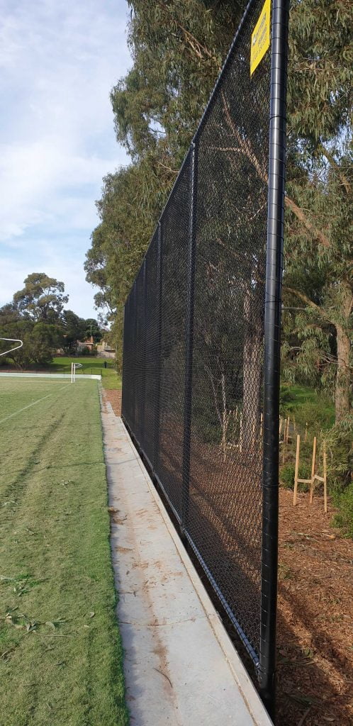 side on photo of ball screen fencing 